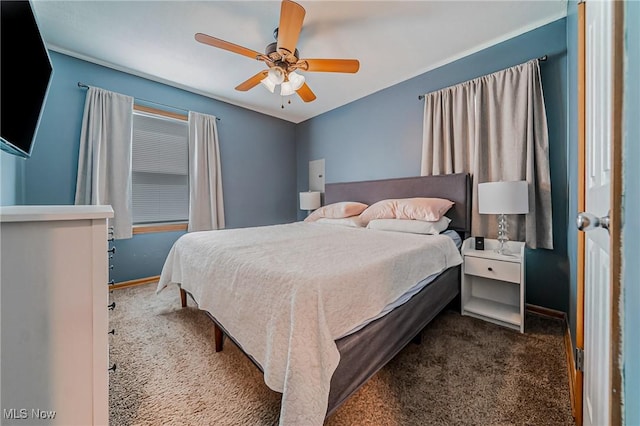 bedroom with carpet floors, ceiling fan, and baseboards