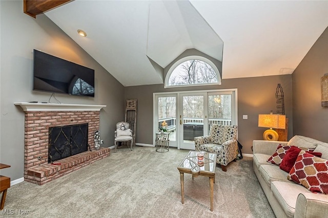 living room featuring baseboards, carpet, and a brick fireplace