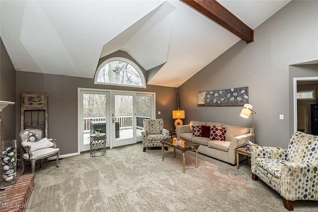 carpeted living area with high vaulted ceiling, beam ceiling, and baseboards