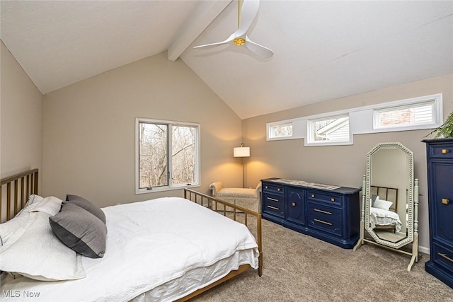 bedroom with lofted ceiling with beams, carpet floors, and a ceiling fan