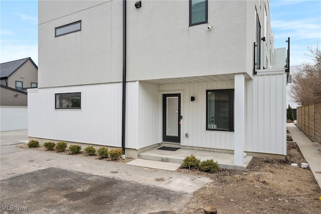 view of front of house with fence