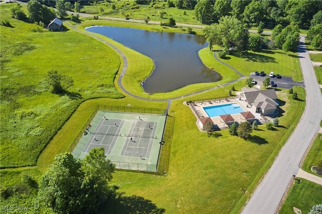 birds eye view of property featuring a water view