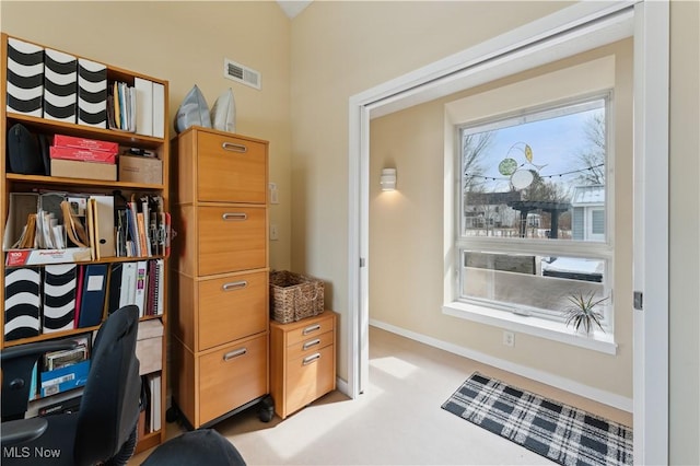 office featuring baseboards and visible vents