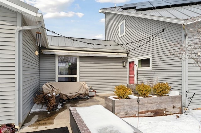 view of snow covered patio