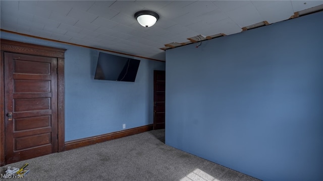 empty room featuring carpet flooring