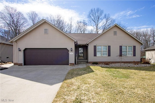 single story home featuring a garage, a front yard, and driveway