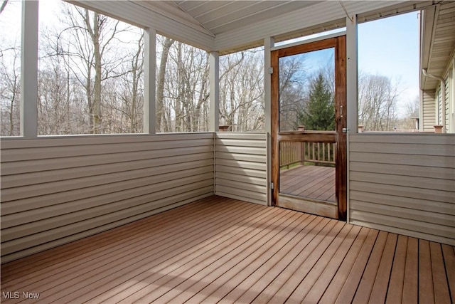 unfurnished sunroom featuring a wealth of natural light