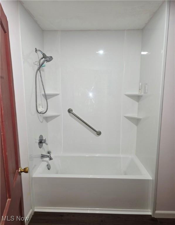 full bathroom with bathtub / shower combination