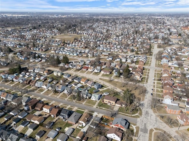 birds eye view of property with a residential view