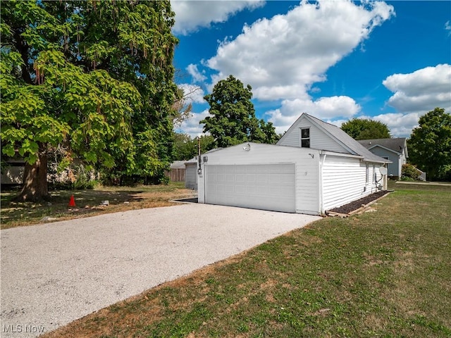 garage with driveway