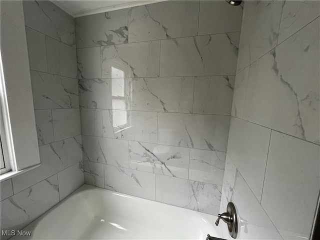 bathroom with shower / bathtub combination