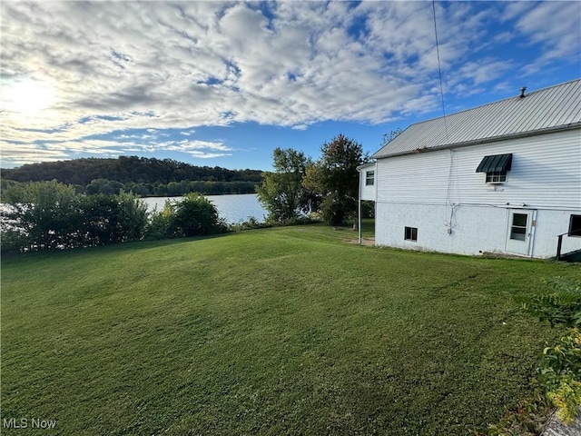 view of yard with a water view