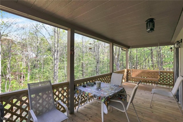 exterior space with wood ceiling