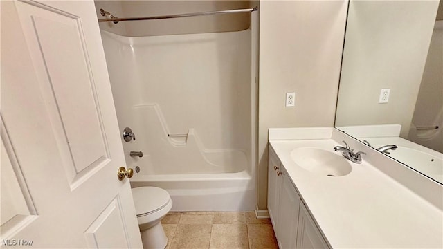 bathroom with vanity, shower / bathing tub combination, and toilet