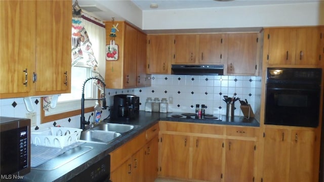 kitchen with stainless steel microwave, backsplash, a sink, black oven, and under cabinet range hood