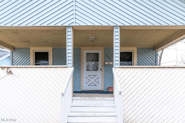 entrance to property with a standing seam roof