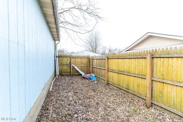 view of yard featuring a fenced backyard