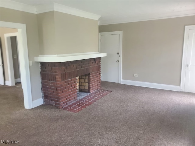 unfurnished living room featuring ornamental molding, carpet, a fireplace, and baseboards