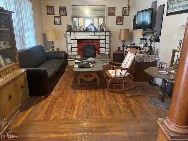 living room with wood finished floors