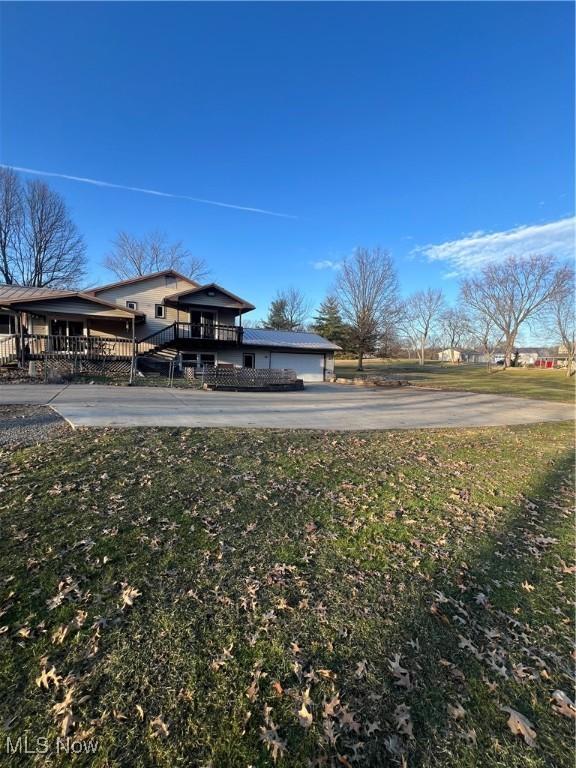 1025 Ohltown Rd, Youngstown, OH 44515 - view of grassy yard featuring driveway