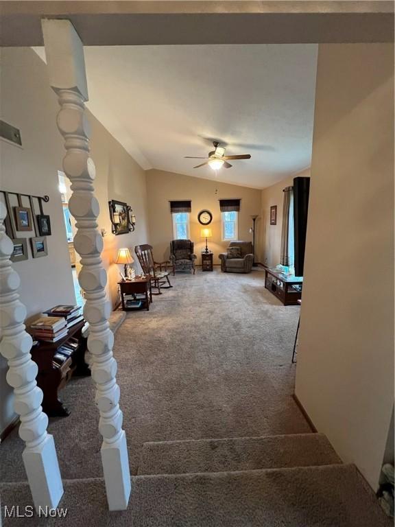 1025 Ohltown Rd, Youngstown, OH 44515 - living room with carpet floors, vaulted ceiling, and a ceiling fan