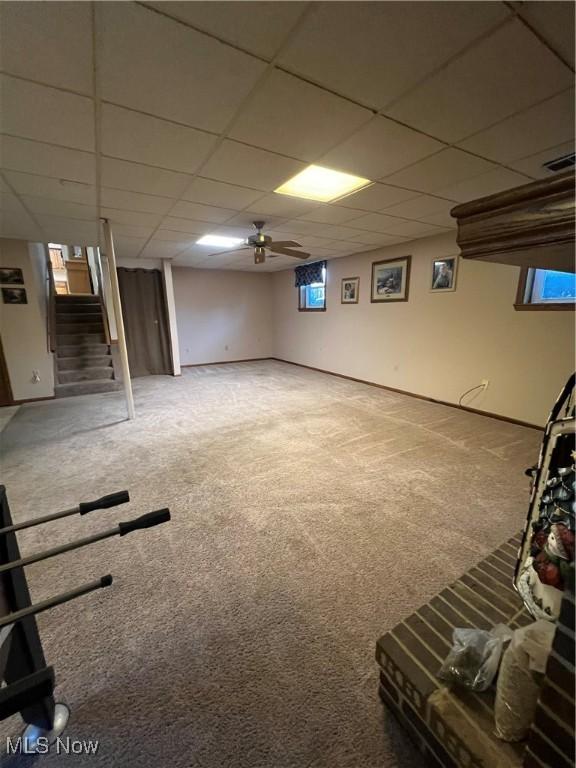 1025 Ohltown Rd, Youngstown, OH 44515 - basement with carpet flooring, stairs, a drop ceiling, and a ceiling fan