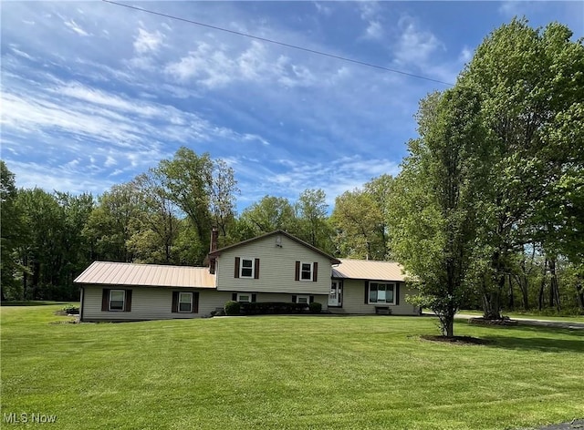 1025 Ohltown Rd, Youngstown, OH 44515 - rear view of house with a yard and metal roof