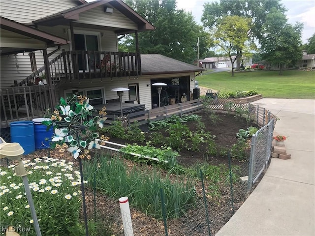 1025 Ohltown Rd, Youngstown, OH 44515 - view of green lawn featuring a garden and a patio