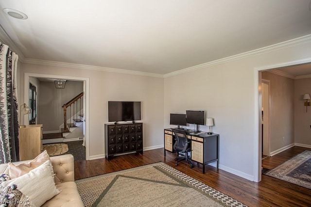 office space with crown molding, baseboards, and wood finished floors