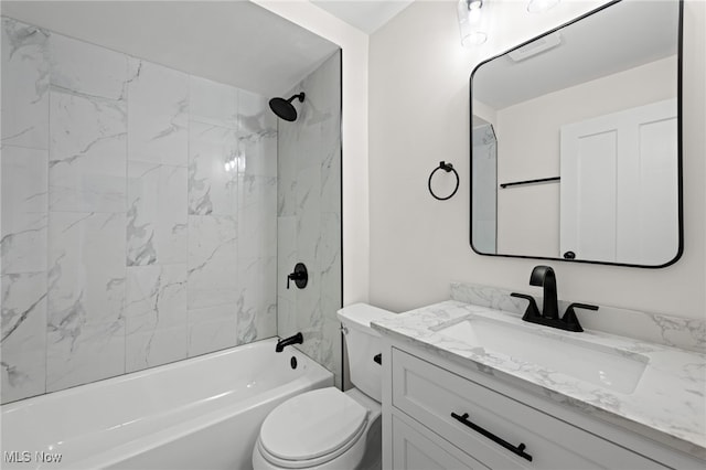 bathroom with  shower combination, vanity, and toilet