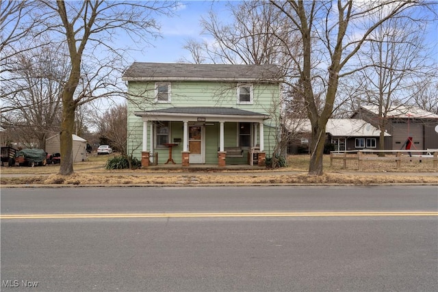 traditional home featuring a porch