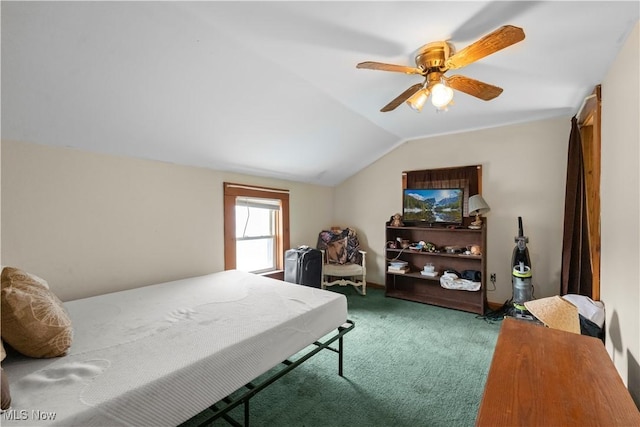 bedroom featuring a ceiling fan, lofted ceiling, and carpet