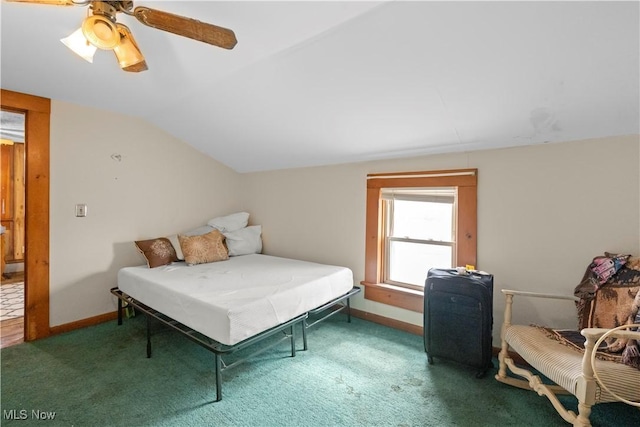 bedroom featuring lofted ceiling, carpet, baseboards, and a ceiling fan