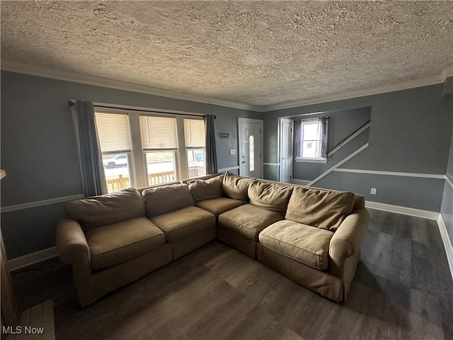 living area featuring baseboards, ornamental molding, and dark wood finished floors