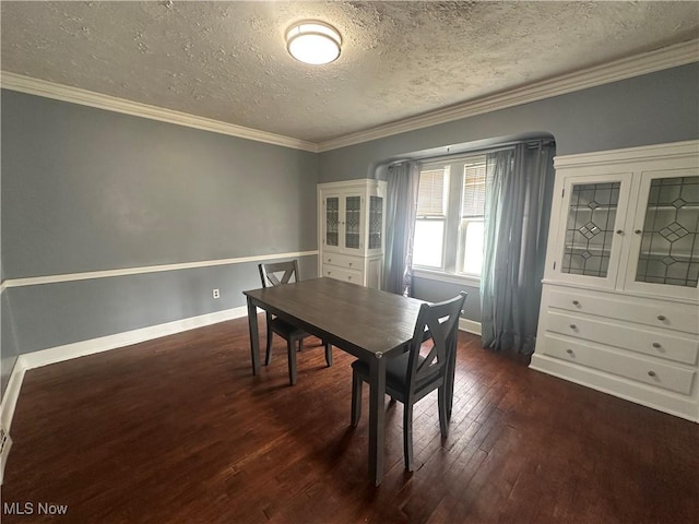 dining room with crown molding, baseboards, and dark wood-type flooring