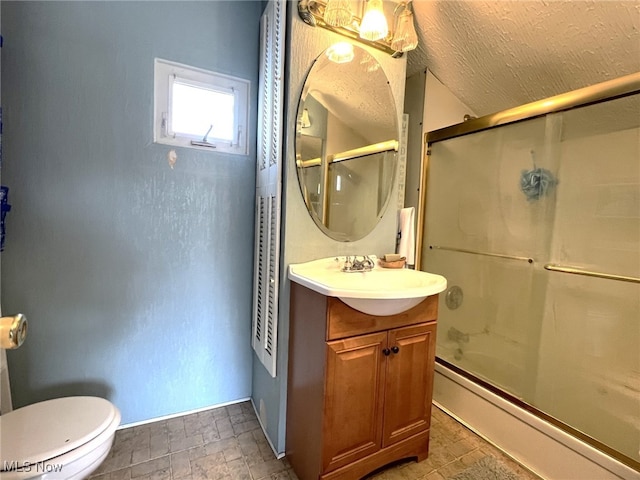 bathroom with toilet, a baseboard radiator, an enclosed shower, and vanity