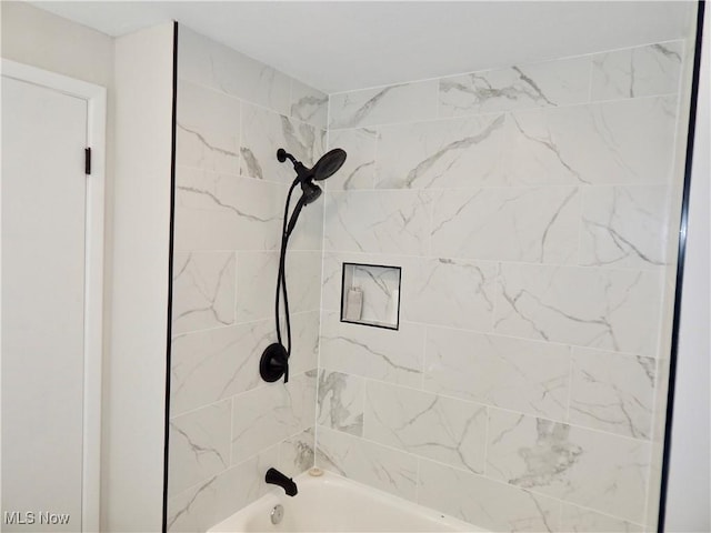 bathroom featuring bathing tub / shower combination