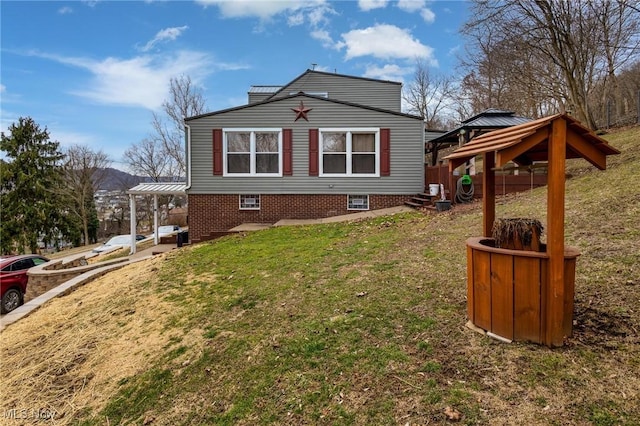 view of property exterior with a yard and a gazebo