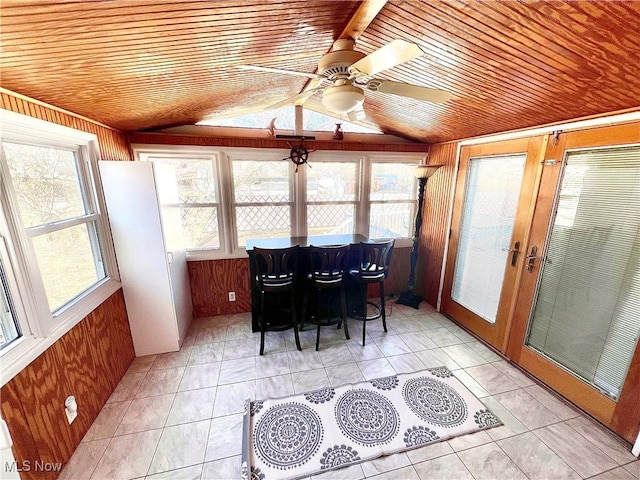 sunroom with vaulted ceiling, french doors, and wood ceiling