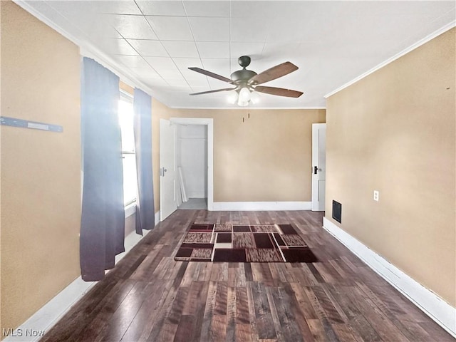 471 E N Ave, East Palestine, OH 44413 - foyer entrance featuring a ceiling fan, ornamental molding, wood finished floors, and baseboards