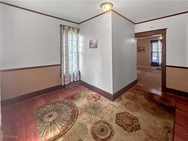 471 E N Ave, East Palestine, OH 44413 - spare room featuring crown molding, baseboards, and wood finished floors