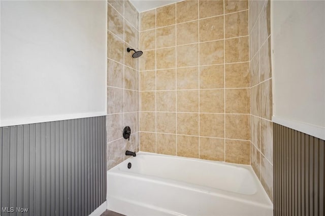 full bath featuring shower / bathtub combination