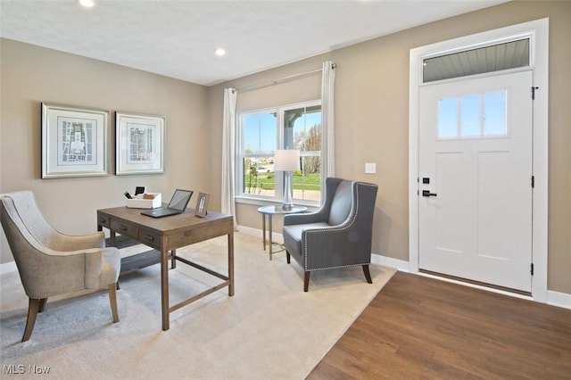 office featuring recessed lighting, baseboards, and wood finished floors