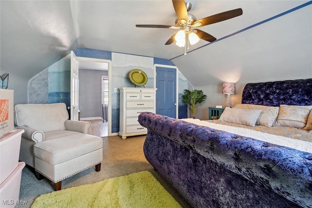 bedroom with lofted ceiling, ceiling fan, and baseboards