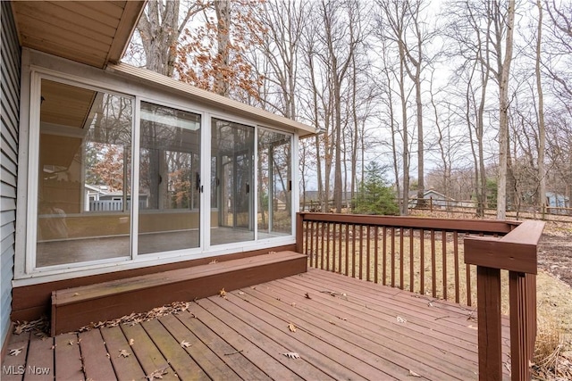 deck with a sunroom