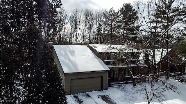 view of snow covered garage