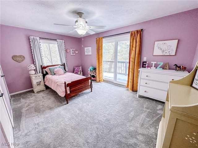 bedroom featuring access to outside, multiple windows, and light carpet