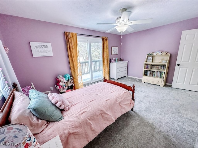 bedroom with baseboards, ceiling fan, access to exterior, a textured ceiling, and carpet flooring