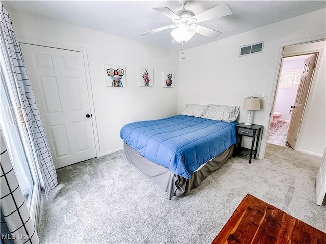 bedroom with baseboards, visible vents, ceiling fan, and carpet flooring