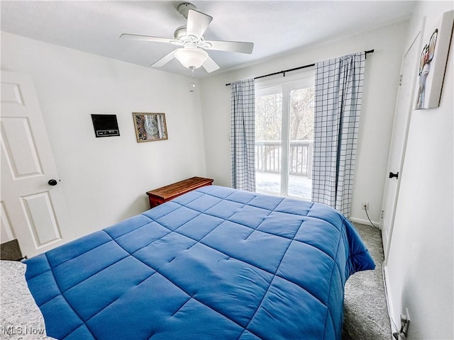 carpeted bedroom with access to outside and a ceiling fan